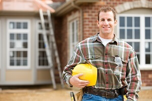 contractor in front of new home