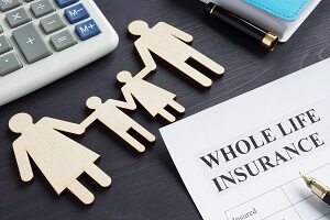 whole life insurance application form and pen