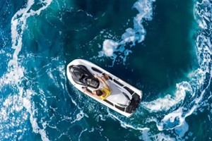 man on a waverunner on the caribbean sea
