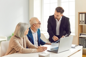 Agent Helping Retail Business Owners to Select Insurance Plan