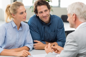 Senior Agent Explaining Differences Between Retail and General Business Insurance