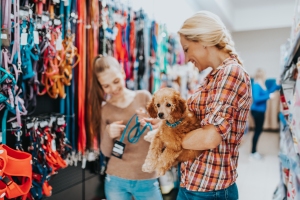 Female Customers Checking Accessories in Pet Store