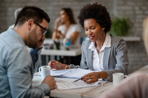 Agent Explaining Next Steps After Auditing Workers Compensation Insurance