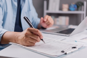 Businessman Doing Workers Comp Audit