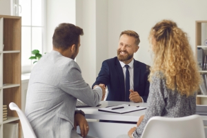 Courier Business Owner Meeting with Agent for Workers Compensation Insurance